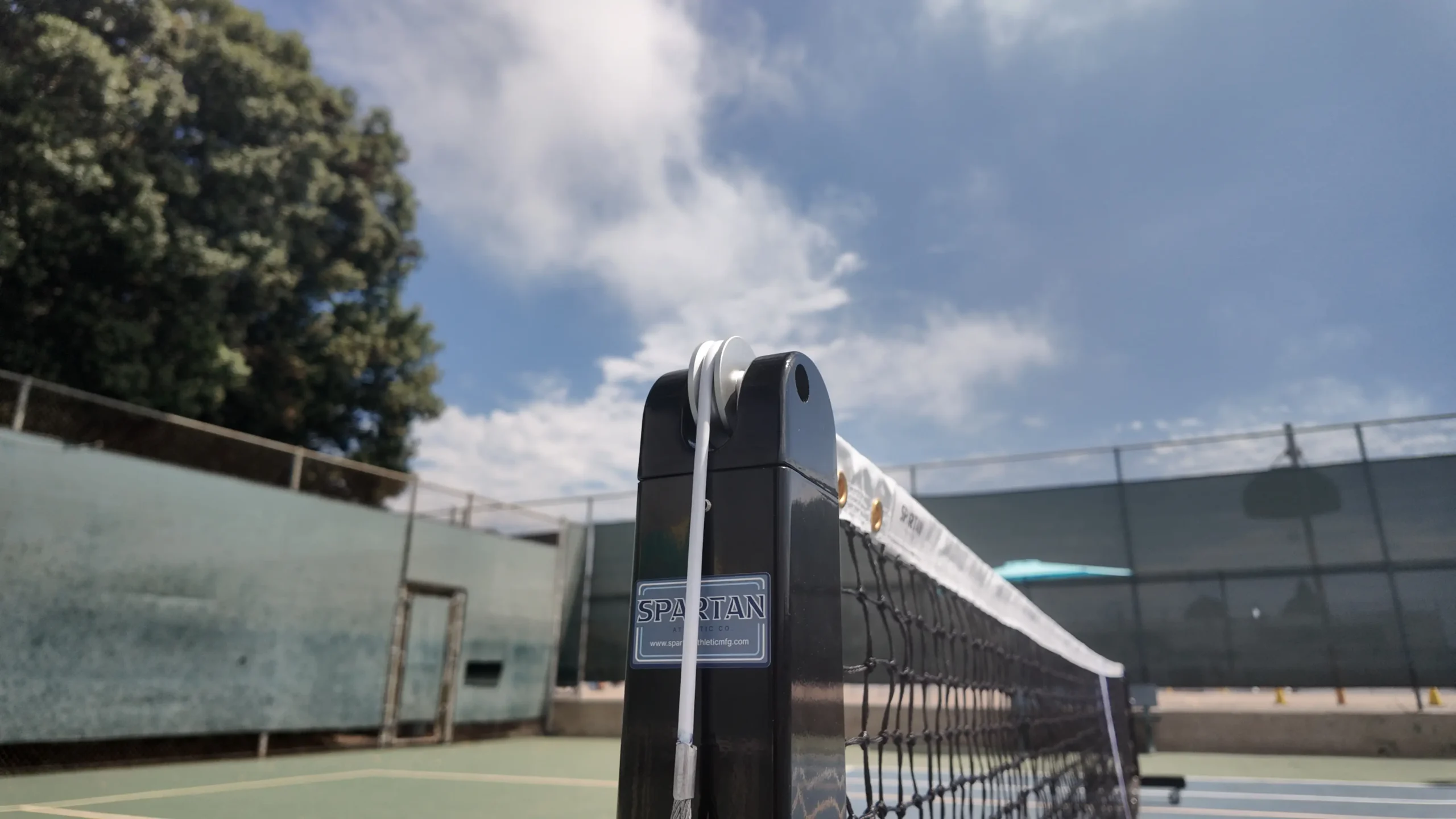 Spartan portable pickleball net close up cap and net cable